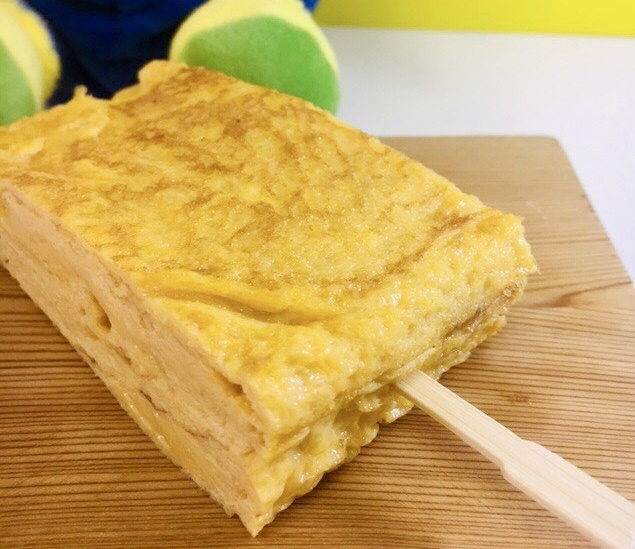 【ハーフ！玉子焼き】
・ご要望にお応えして半分のサイズにしました！
玉子は栄養密度が高く、昔から夏バテ予防に効果的とされています。これを食べて応援のパワーに変えて下さい！
■価格：300円
■販売店舗：玉子屋てっちゃん(ファンエリア)